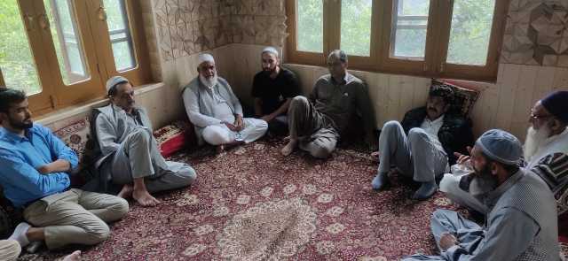 People visiting Mudasir’s home to express their condolences. Photo by Idrees Bukhtiyar