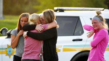 Two people and shooter die in shooting outside Iowa church