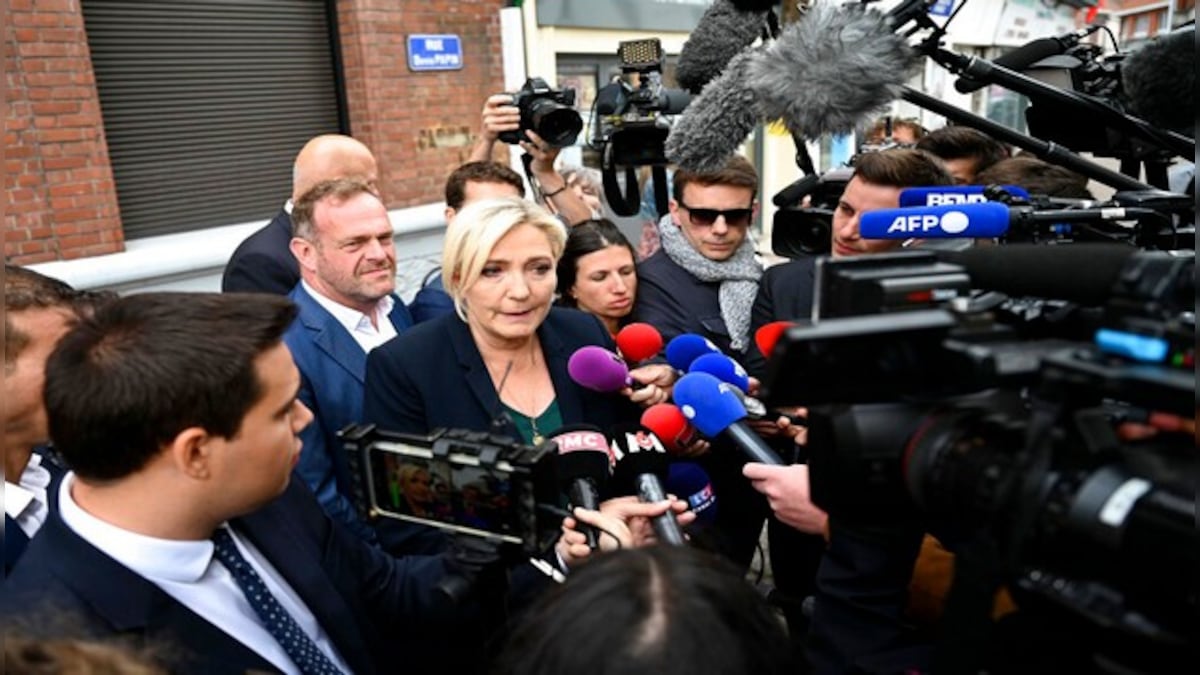 French presidential polls: Far-right's Marine Le Pen hails 'seismic event' as Macron reduced to minority