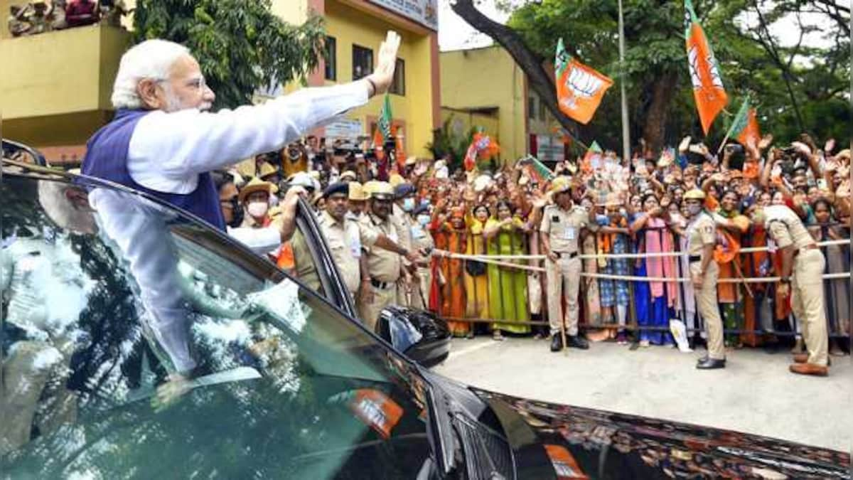 WATCH: PM Modi stops car on Bengaluru street to greet cheering crowd waving BJP flags, raising 'Modi, Modi' slogans