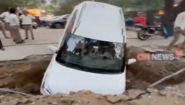 Chennai Civic Apathy: Car falls into pit in middle of the road, watch video Chennai Civic Apathy: Car falls into pit in middle of the road, watch video
