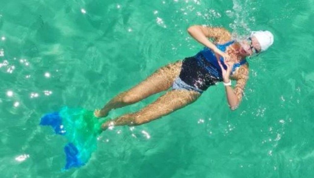 US woman creates Guinness World Record by swimming furthest distance in mermaid fin US woman creates Guinness World Record by swimming furthest distance in mermaid fin