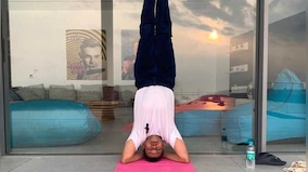 International Yoga Day: What Sirsasana or headstand in Yoga teaches about business