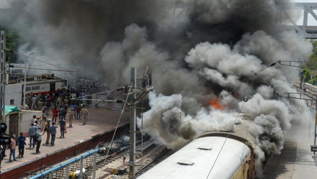 Mobs burn trains, vandalise public property as Agnipath protests intensify: Who will pay for the damages? Mobs burn trains, vandalise public property as Agnipath protests intensify: Who will pay for the damages?