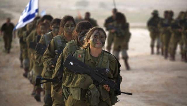 Women in the Israeli Army serve for a period of 24 months unless they volunteer for a unit that requires additional service time. AFP