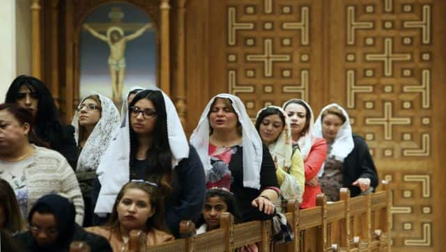 Egyptians Orthodox Copts living in Kuwait attend mass at the St Mark Coptic Orthodox Church in Kuwait City. AFP