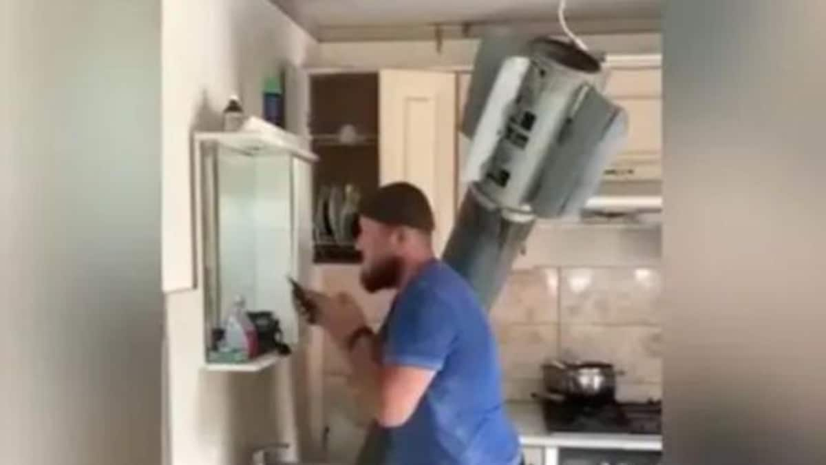 Watch: Ukrainian man casually shaves while rocket lies embedded in home; internet amazed