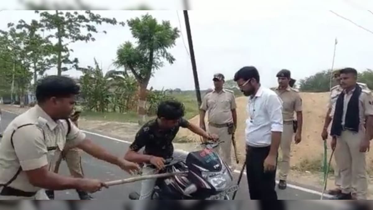 Watch: Bihar SDM mercilessly beats two youths for not wearing helmets