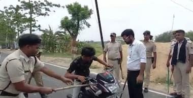 Watch: Bihar SDM mercilessly beats two youths for not wearing helmets