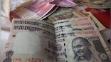 Rupee slips 10 paise to close at 77.60 against US dollar