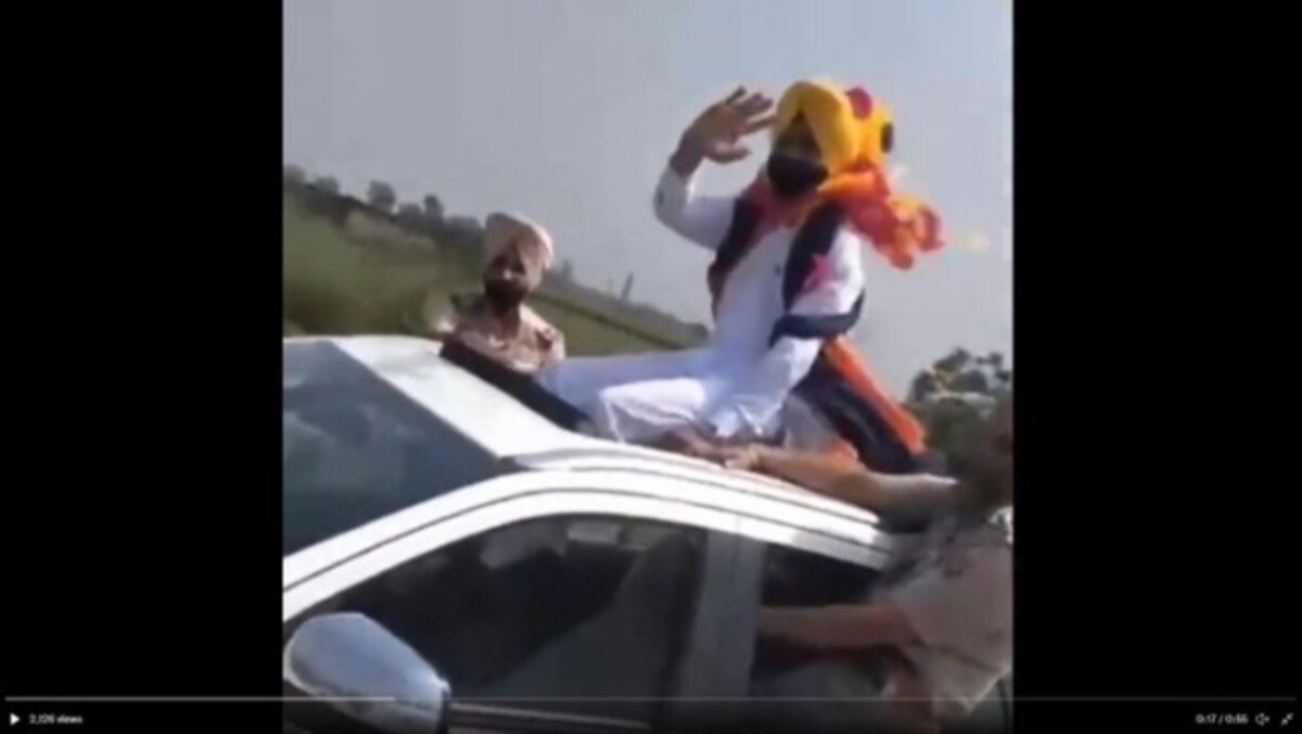 Watch | Punjab Transport Minister travels sitting on car's sunroof, video  stirs controversy