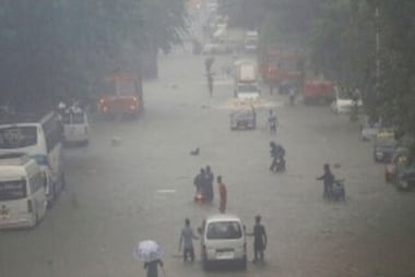 Watch: People dry clothes in Mumbai local train amid heavy rains