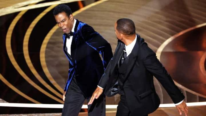 Chris Rock mocks the controversy surrounding Will Smith's Oscars slap