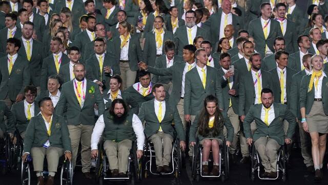 Team Australia participated in the opening ceremony in a very light hearted manner as they managed to photobomb the presenters at every opportunity available. AP