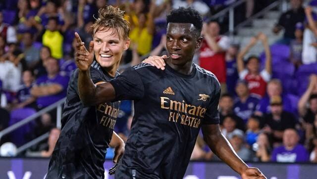 Arsenal's Eddie Nketiah, right, celebrates his goal against Orlando City with Martin Odegaard, left, during the second half of a Florida Cup friendly soccer match Wednesday, July 20, 2022, in Orlando, Fla. (AP Photo/John Raoux)