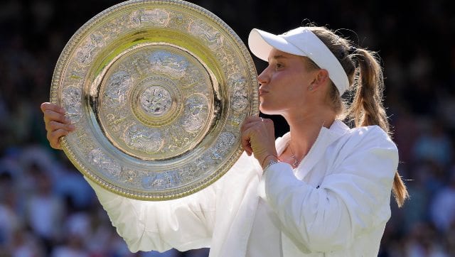  Kazakhstan’s Elena Rybakina kisses the trophy after winning Wimbledon. AP