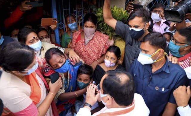 BJP national president JP Nadda meets family members of post-poll violence victims, in Sonarpur, West Bengal, in May 2021. PTI