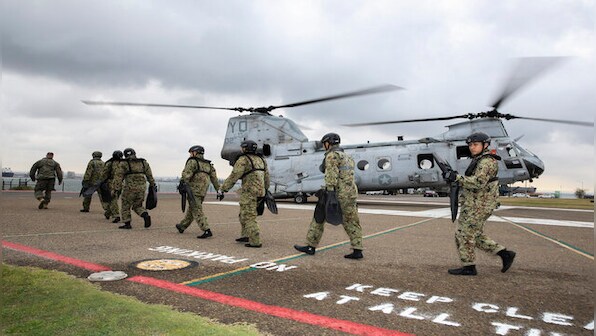 Japan warns of fresh threat from Russia and growing worries about Taiwan in annual defence report