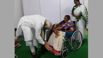 PM Narendra Modi meets family of freedom fighter Pasala Krishna Murthy, touches feet of his 90-year-old daughter