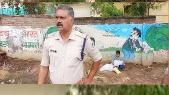 Eight-year-old boy sits with younger brother’s body in lap outside hospital as father looks for ambulance in MP