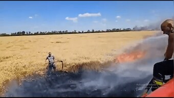 Watch: Ukrainian farmers save harvest from fire caused by Russian shelling; internet hails their efforts