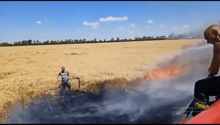 Watch: Ukrainian farmers save harvest from fire caused by Russian shelling; internet hails their efforts
