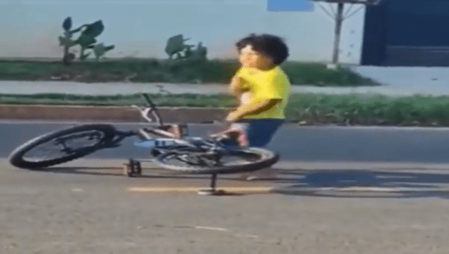 Watch: Boy dances after falling from his bicycle, inspires social media users Watch: Boy dances after falling from his bicycle, inspires social media users