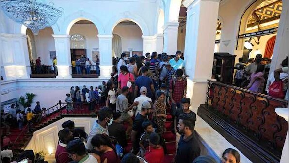 Sri Lanka crisis: President Rajapaksa's whereabouts still not known, protesters continue to occupy his mansion
