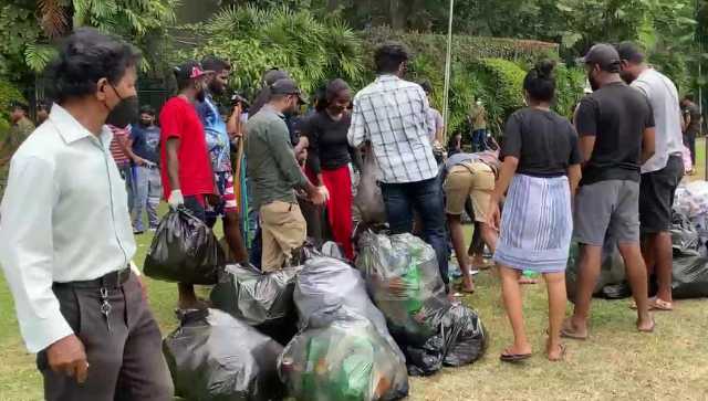 Sri Lanka crisis: After overrunning President Rajapaksa' Colombo mansion, protesters 'feel responsible', clean up area Sri Lanka crisis: After overrunning President Rajapaksa' Colombo mansion, protesters 'feel responsible', clean up area