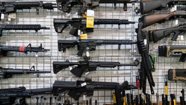 US: AR-15 style guns sold as a sign of manhood as shootings rise US: AR-15 style guns sold as a sign of manhood as shootings rise