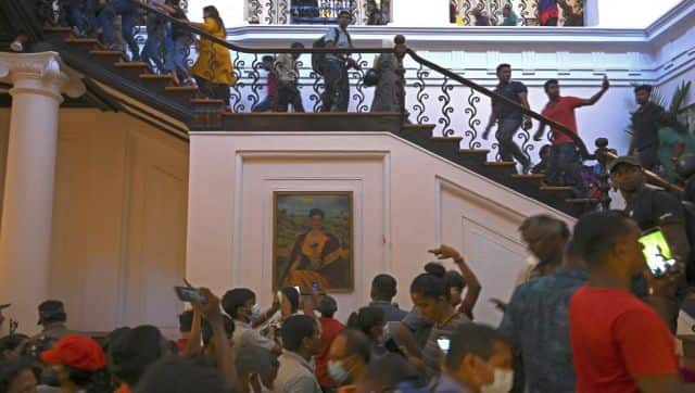 People crowd inside the Sri Lanka's presidential palace, in Colombo, a day after it was overrun by anti-government protesters. AFP