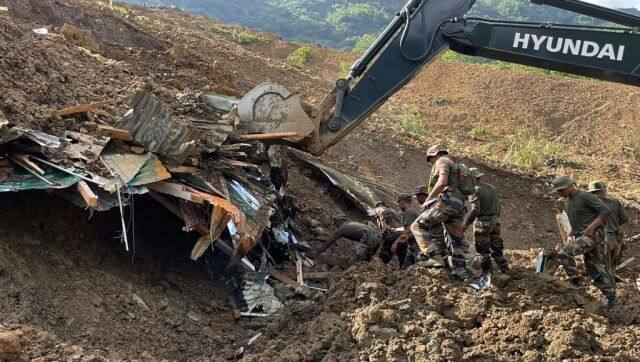 Security forces and disaster relief teams search for survivors and victims after a landslide in Noney district. Indian Army/AFP