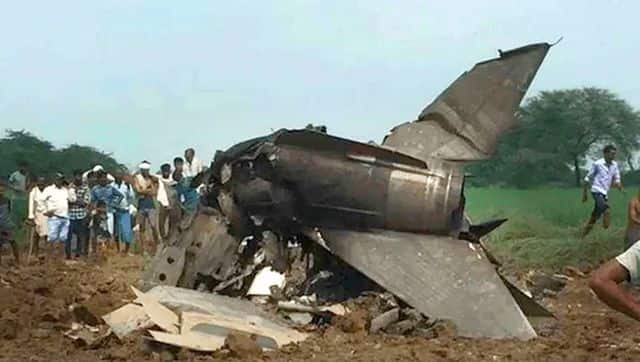 File image of the wreckage of the Indian Air Force MiG-21 Bison fighter jet in a field after the 2021 crash in Gwalior. Group Captain Ashish Gupta lost his life in the tragic accident. PTI