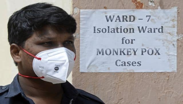 A security guard stands at the entrance of an isolation ward for monkeypox patients at a government hospital in Hyderabad. AFP