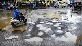 Traffic cops battle chronic pothole menace on Mumbai roads