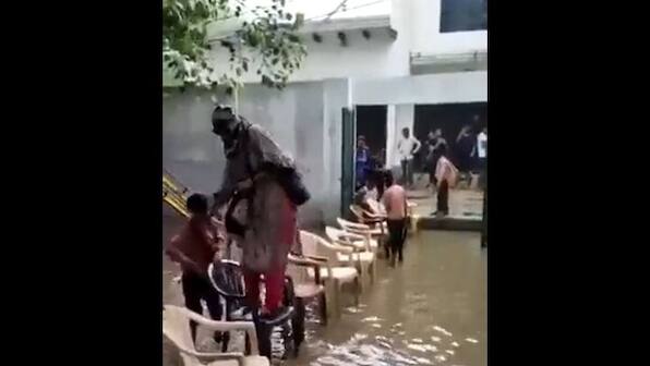 Students create chair-bridge for teacher to help her enter school, watch video here