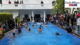 Watch | Protestors swim in President Gotabaya Rajapaksa’s pool, enter kitchen after storming his official residence 