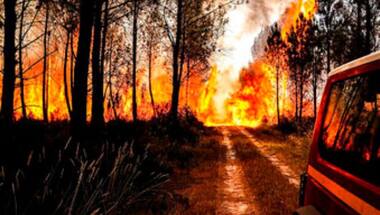 Wildfires blaze across sweltering southwest Europe