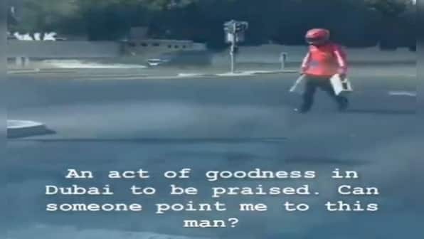 Watch: Food delivery agent removes concrete blocks from road to avoid traffic disruption, Dubai Prince appreciates