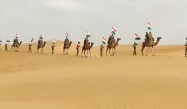 'Har Ghar Tiranga': Atop camels, BSF marches through desert with Tricolour 'Har Ghar Tiranga': Atop camels, BSF marches through desert with Tricolour