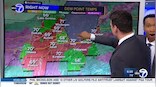 Weather reporter reacts as he discovers TV with touch screen technology