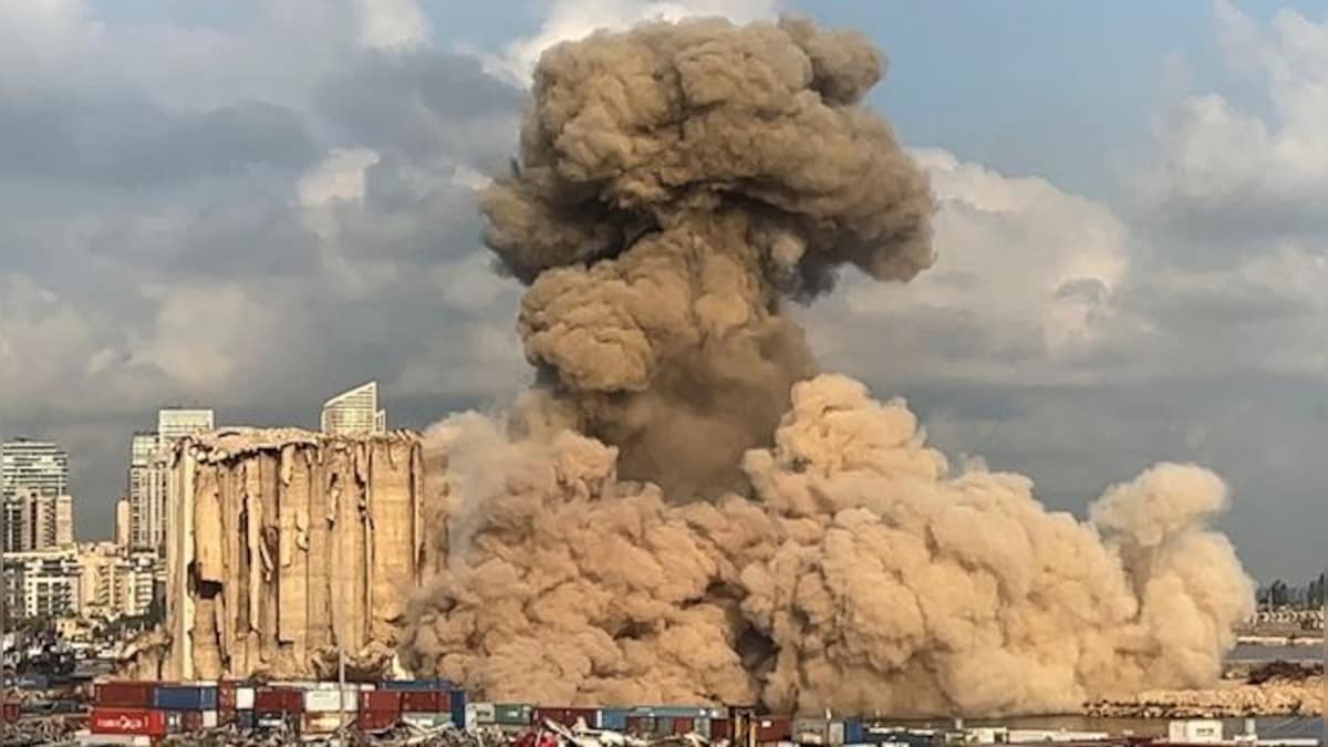 Lebanon: Large section of smouldering Beirut Port silos collapses in a cloud of dust, no injuries reported