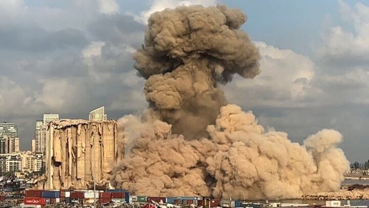 Lebanon: Large section of smouldering Beirut Port silos collapses in a cloud of dust, no injuries reported