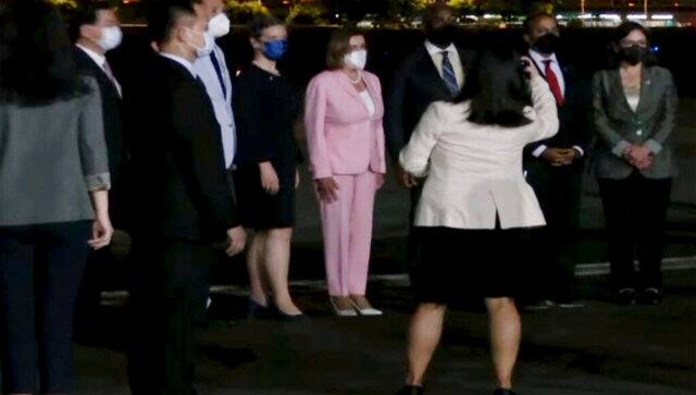 n this image taken from video, US House Speaker Nancy Pelosi, center, arrives in Taipei, Taiwan. AP