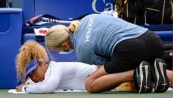 Naomi Osaka retires in Toronto opener with back pain; Emma Raducanu exits