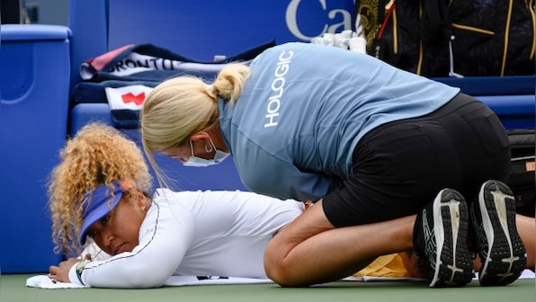 Naomi Osaka retires in Toronto opener with back pain; Emma Raducanu exits