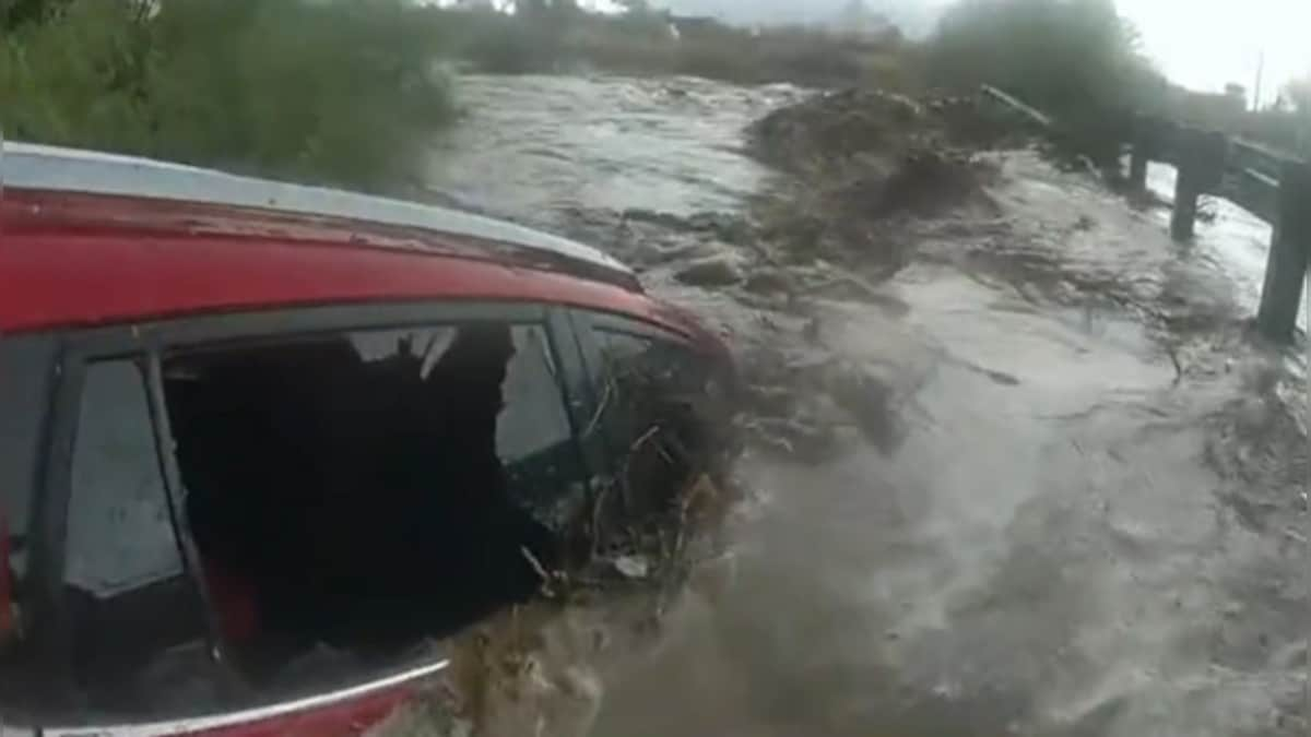 Watch: Arizona police rescues woman trapped inside car stuck in flood waters