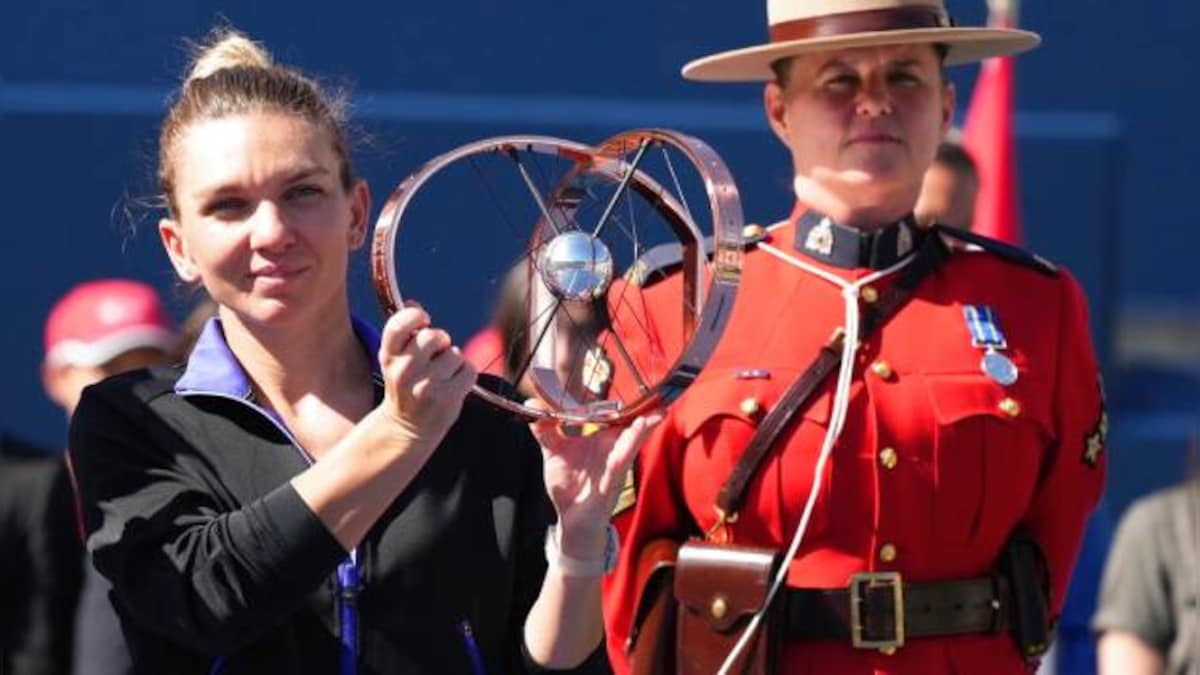 Toronto Masters: Simona Halep holds off Beatriz Haddad Maia to win third WTA Canadian crown