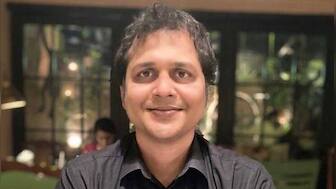 TMC claims poll officials forcing people to link voter ID with Aadhaar; EC says it is 'voluntary'