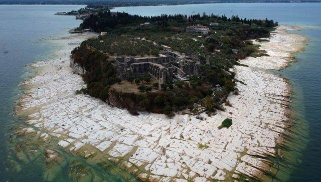 Water levels have receded due to drought at Lake Garda in Italy. AP